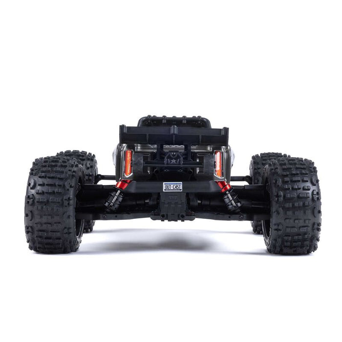 OUTCAST 4X4 4S BL 1/10TH 4WD STUNT TRK (GUNMETAL)