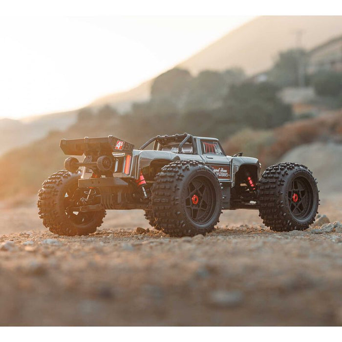 OUTCAST 4X4 4S BL 1/10TH 4WD STUNT TRK (GUNMETAL)