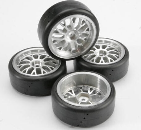Tires, Pro-Trax on-road (medium compound with contoured inserts) (mounted and glued to part #4872 wheels) (2 left, 2 right)