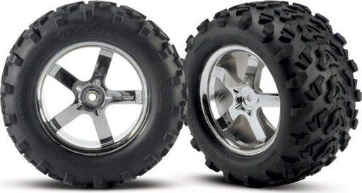 Tires & wheels, assembled, glued (Hurricane chrome wheels, Maxx tires (6.3" outer diameter), foam inserts) (2) (fits Revo/Maxx series)